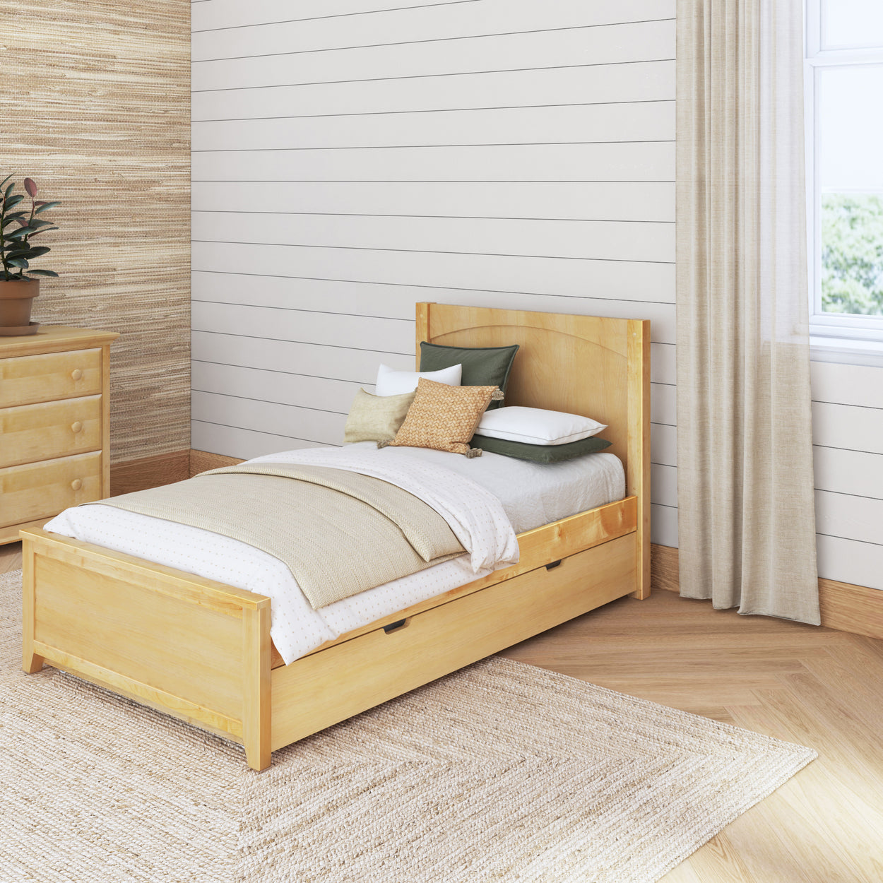 Minimalist wooden single bed with neutral bedding in a cozy bedroom.