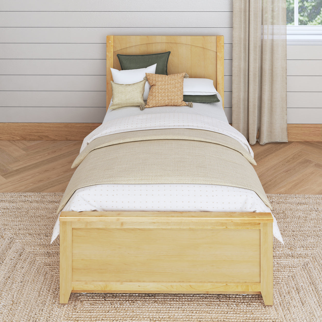 Single wooden bed with neutral bedding and decorative pillows in a cozy bedroom.