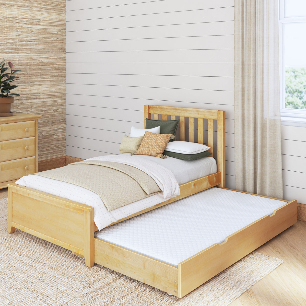 Trundle twin bed with wooden frame in modern bedroom setting.