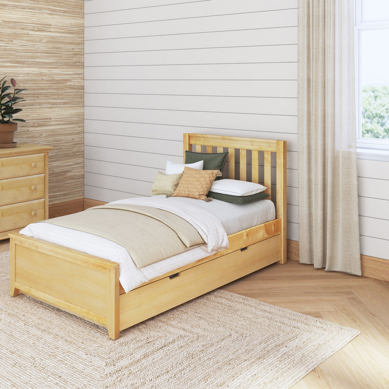 Single wooden bed with beige and white bedding in a cozy bedroom.