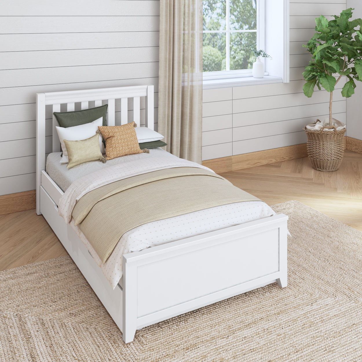 Single white bed in a modern bedroom setting with neutral decor and green plant.