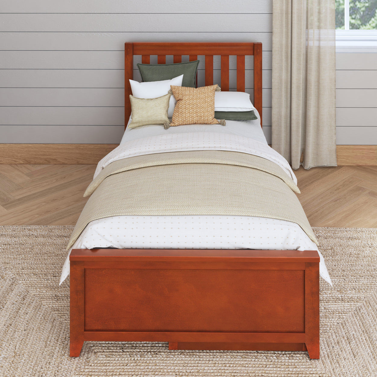 Single wooden bed with cozy pillows and beige bedding in a minimalist bedroom.