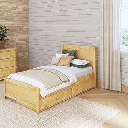 Cozy bedroom with a wooden single bed featuring storage drawers, beige bedding, decorative pillows, and a matching dresser.
