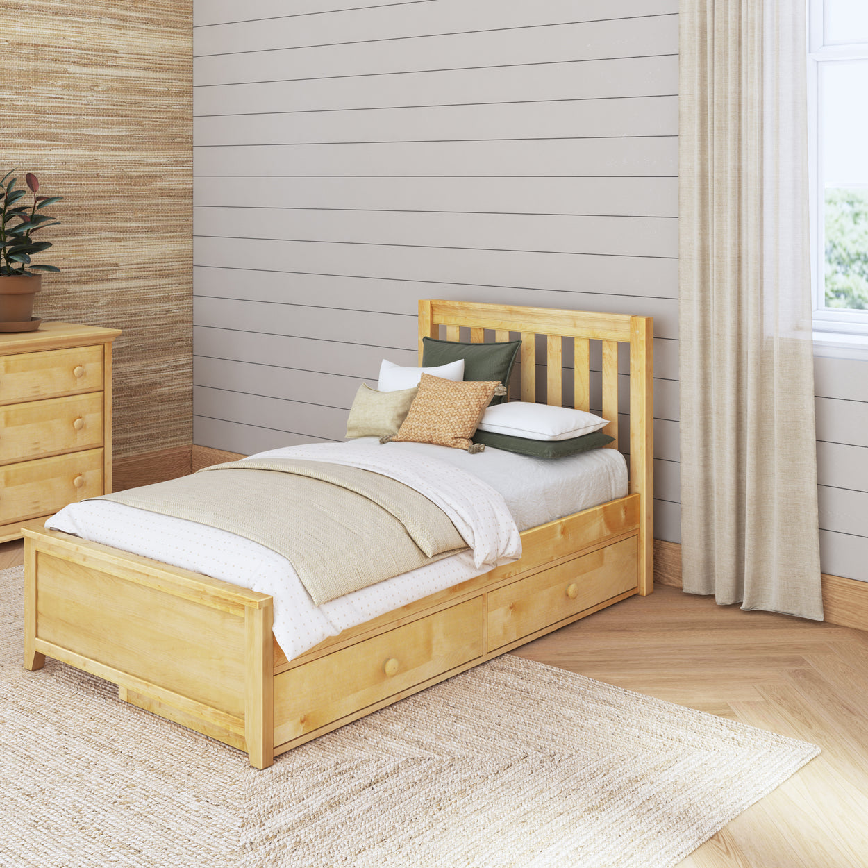 Wooden single bed with under-storage drawers in a cozy bedroom.