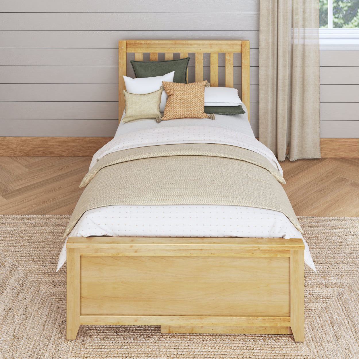 Stylish modern bedroom with wooden bed frame, layered bedding, and throw pillows in a cozy, neutral-toned setting.