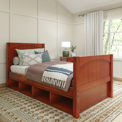 Solid wood bed frame with built-in storage, cozy bedding, and decorative pillows in a bright, modern bedroom.