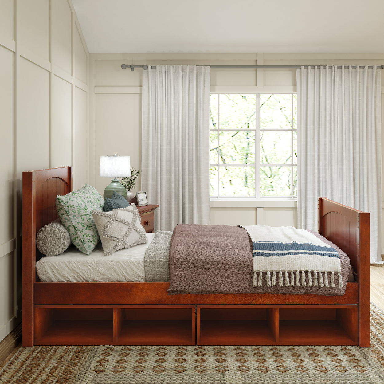 Cozy bedroom with wooden storage bed, decorative pillows, and soft lighting.