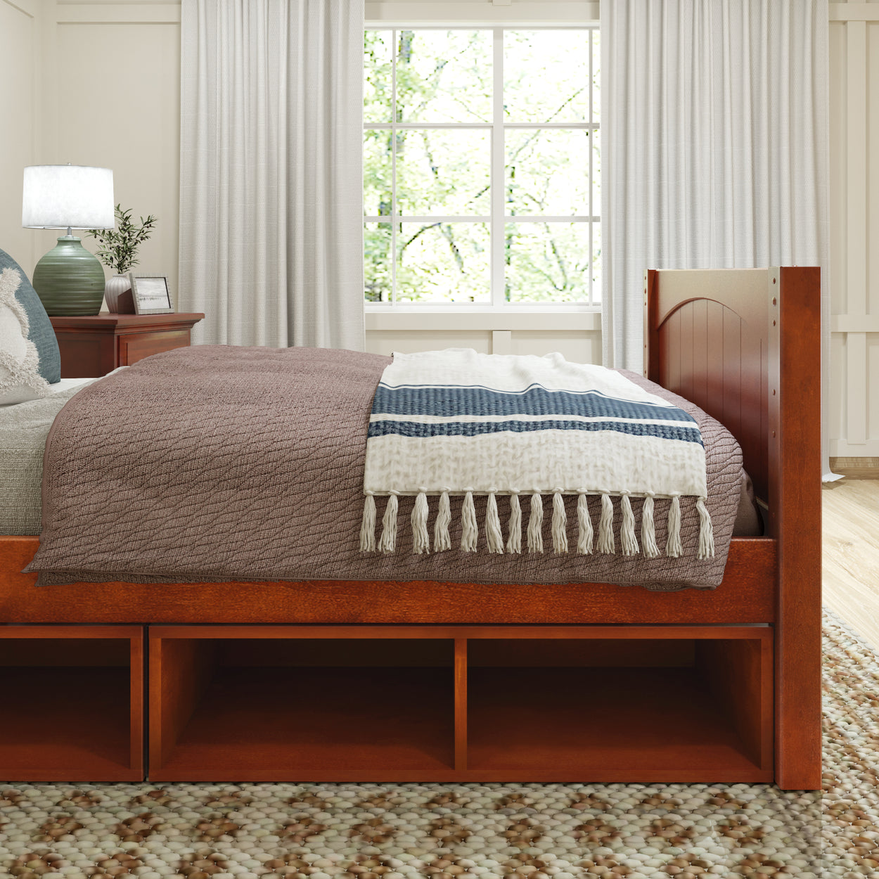 Elegant bedroom with wooden bed frame and decorative throw blanket, showcasing cozy interior design.