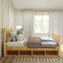 Cozy bedroom with wooden bed frame, decorative pillows, and large window with curtains.