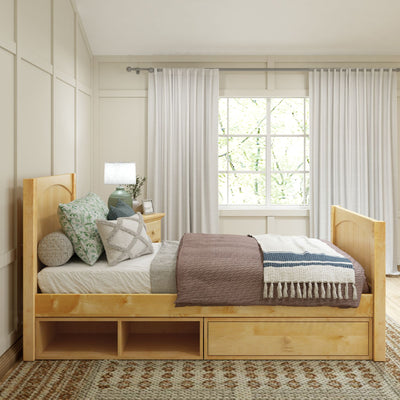 Minimalist bedroom with wooden bed frame, cozy pillows, natural light from window, and elegant decor.