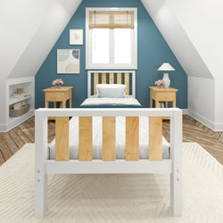 Cozy attic bedroom with a modern design featuring a wooden bed, teal accent wall, and natural decor elements.