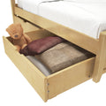 Under-bed storage drawer with teddy bear and pillows for efficient space organization.