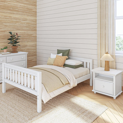 Neutral nursery: white wooden toddler bed with beige bedding, woven grass-cloth wallpaper, white shiplap accent wall, bedside lamp