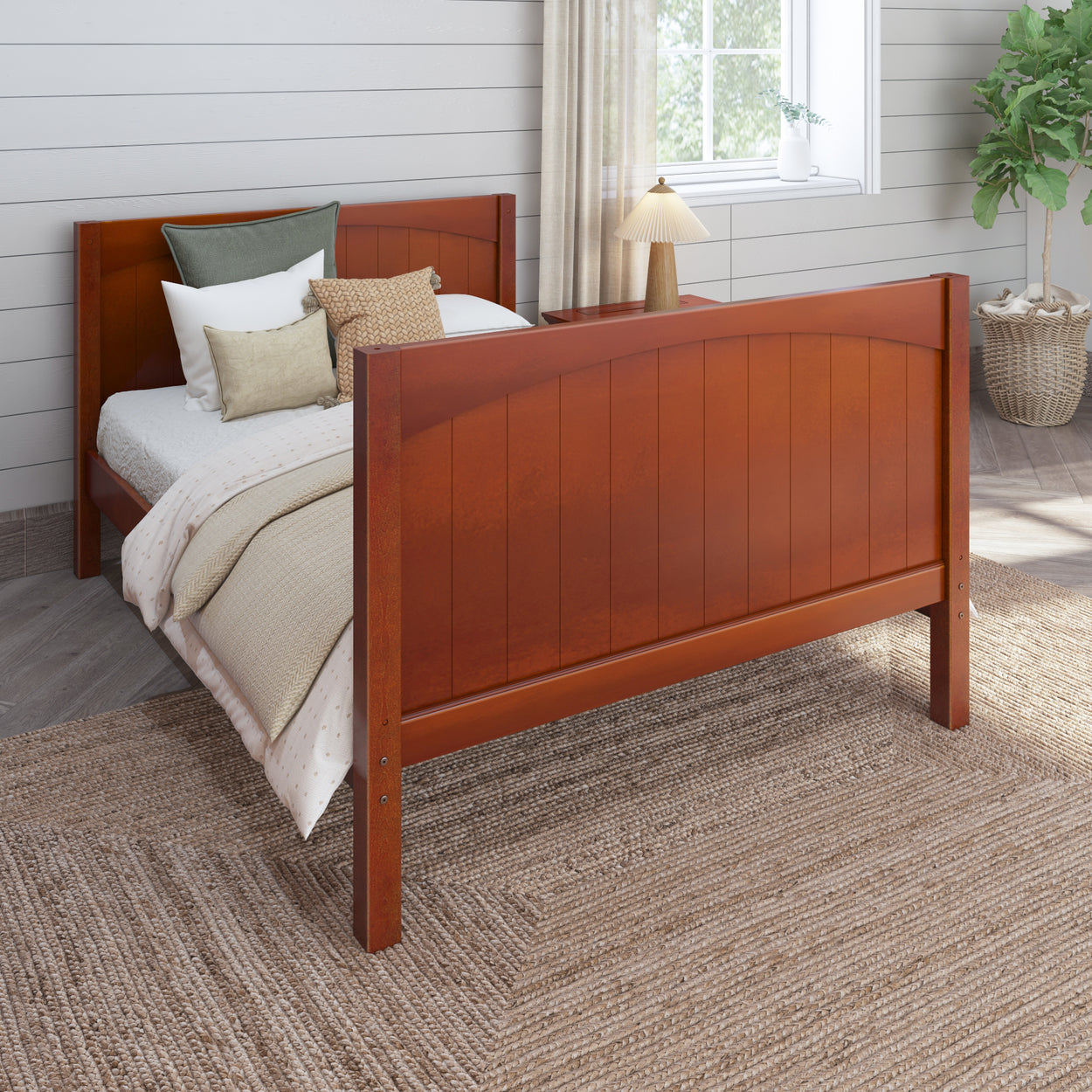 Wooden bed frame with cozy bedding and decorative pillows in modern bedroom setting.