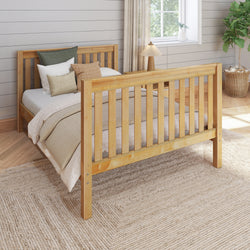 Wooden bed frame with cozy bedding in a modern bedroom setting, featuring neutral tones and natural light.