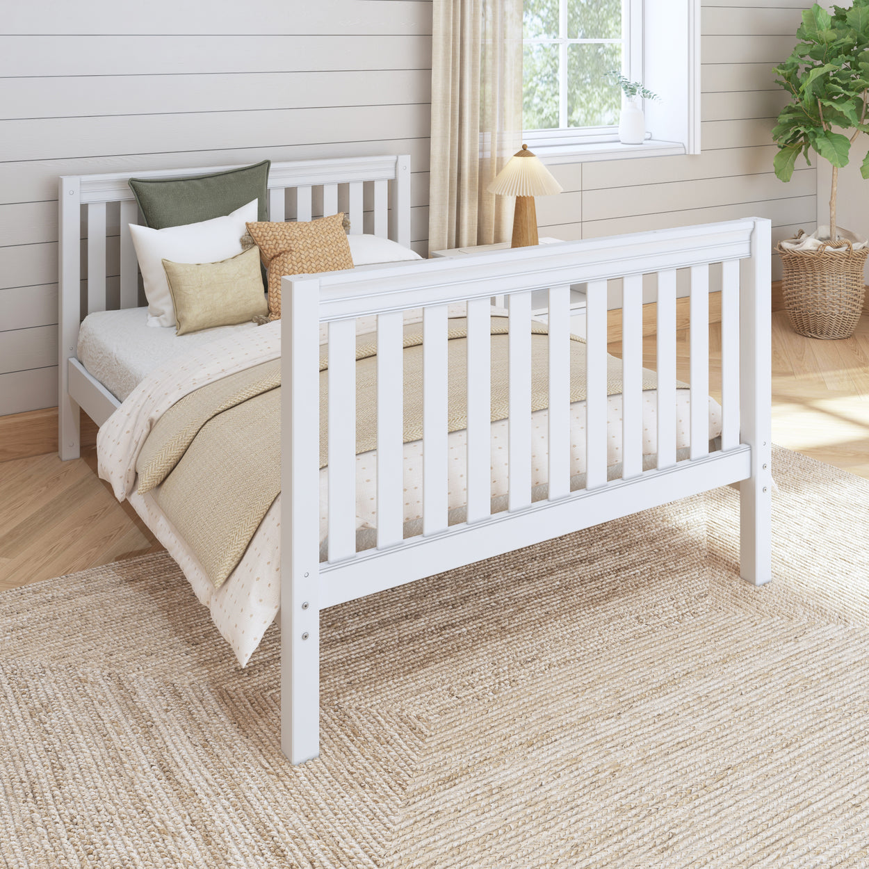 Modern white wooden bed frame in a bright cozy bedroom with neutral bedding and decorative pillows, showcasing elegant interior design.