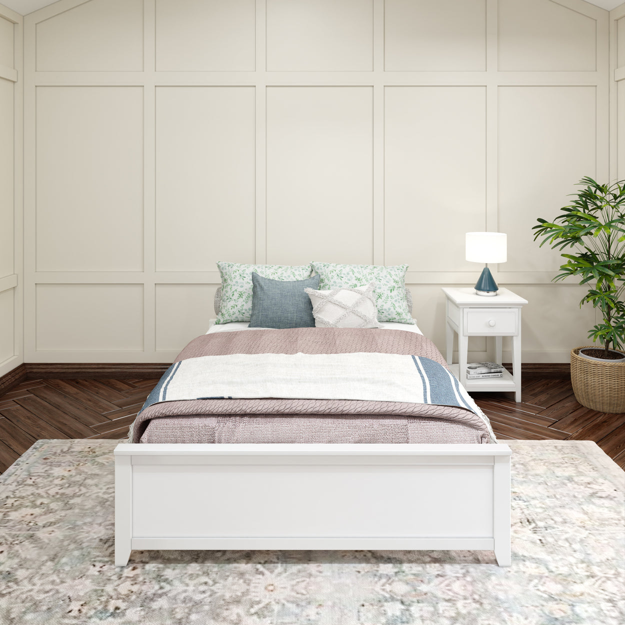 Cozy bedroom interior with white bed, decorative pillows, nightstand, lamp, and potted plant.