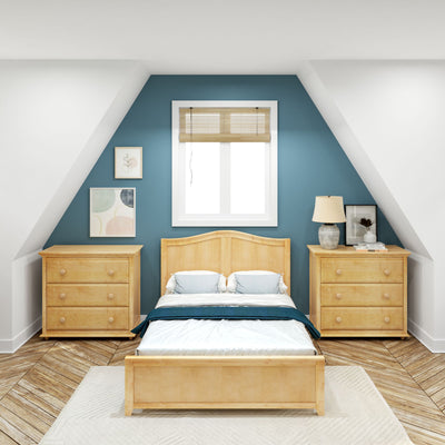 Cozy attic bedroom with wooden bedframe, blue accent wall, and dresser featuring modern decor.
