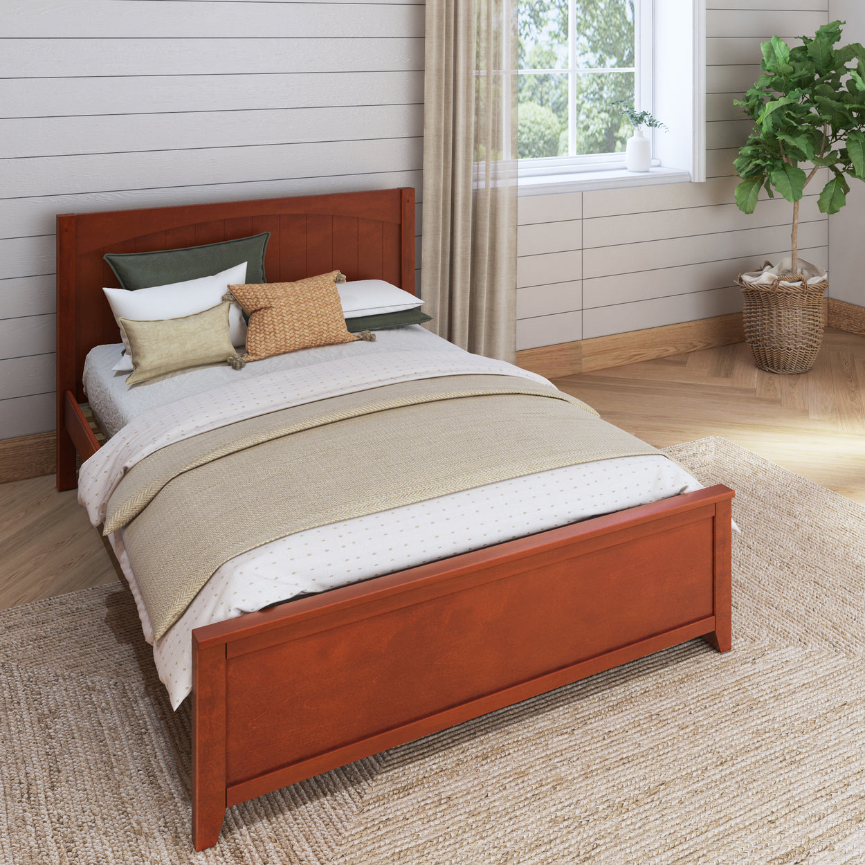Wooden platform bed with layered bedding in a cozy bedroom setting.