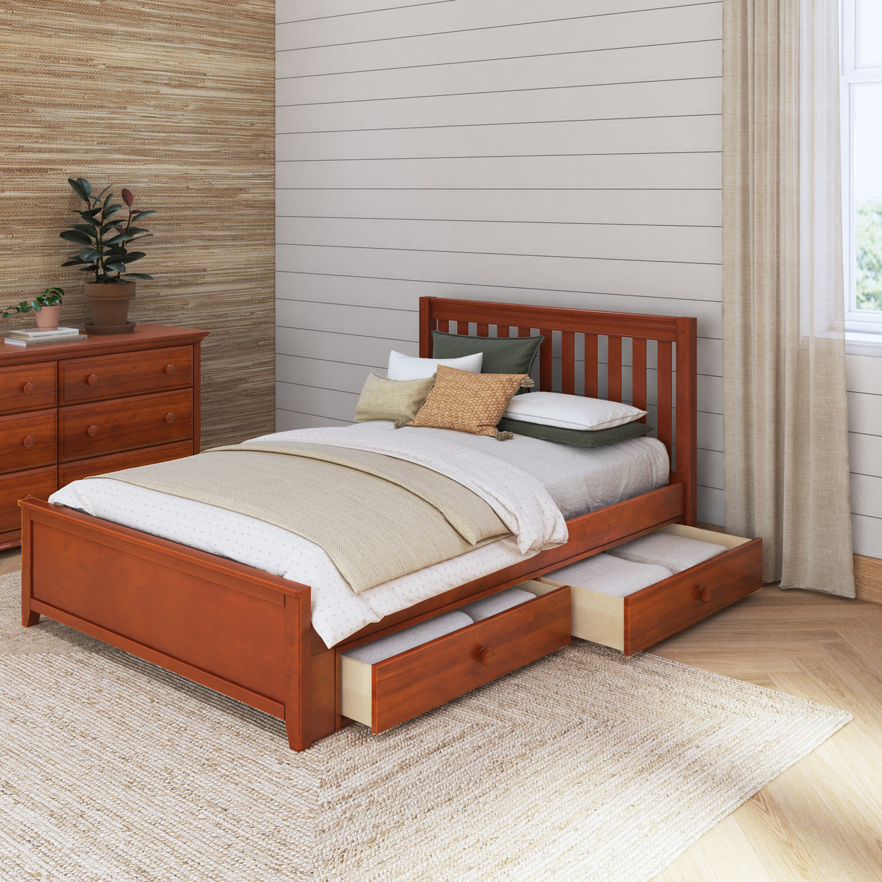 Wooden platform bed with storage drawers, beige bedding, and cozy bedroom decor.
