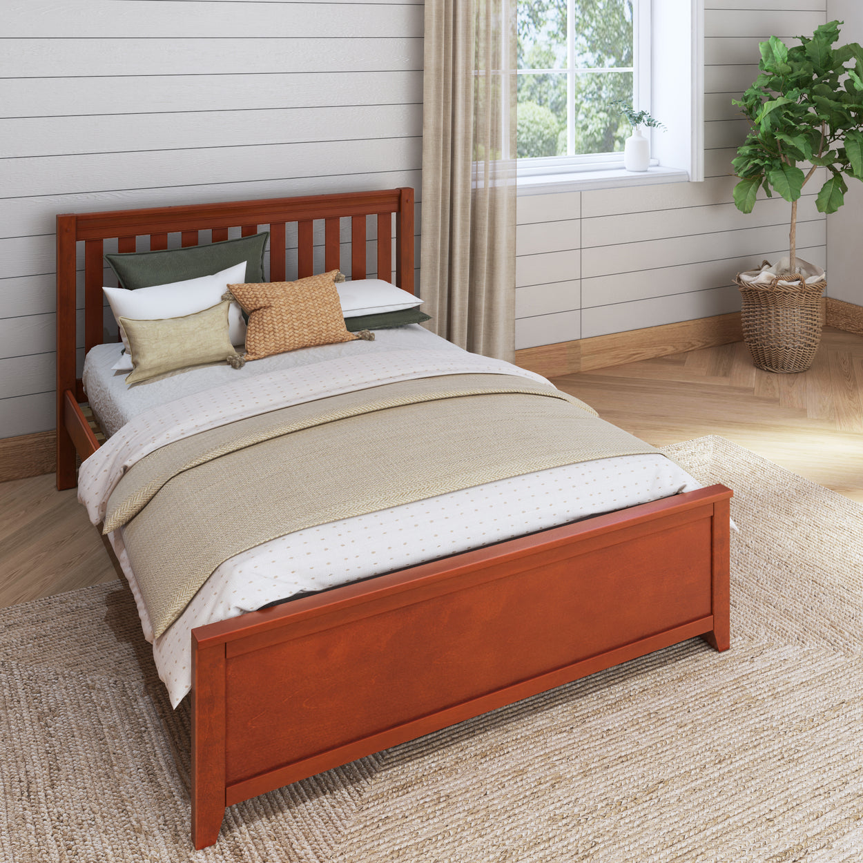 Wooden bed frame with cozy bedding in a modern bedroom with potted plant and natural light.