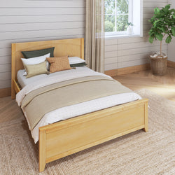 Cozy bedroom with a light wooden bed frame, neutral bedding, and indoor plant by the window.