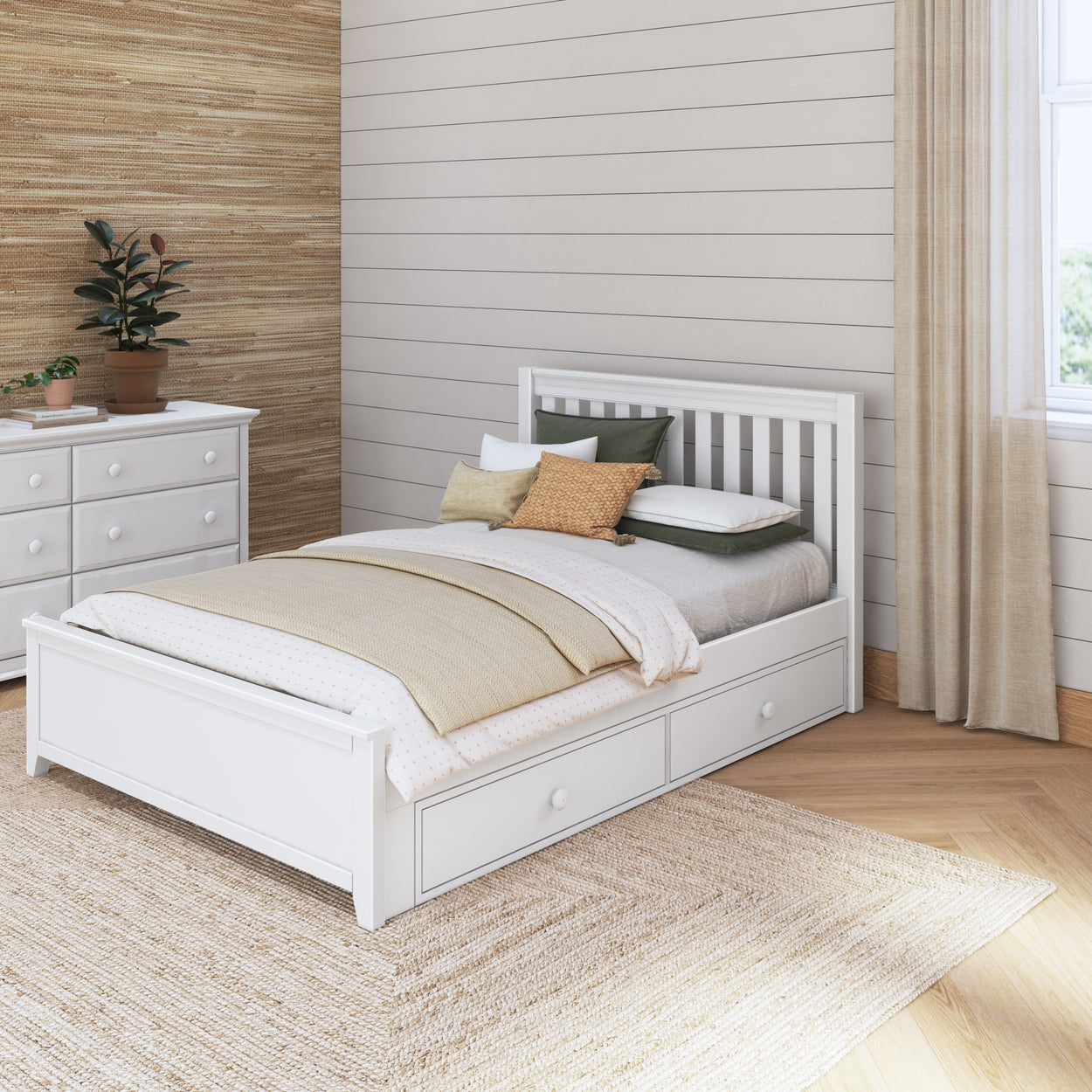 White wooden bed with storage drawers in a cozy bedroom with neutral decor and natural light streaming through the window.