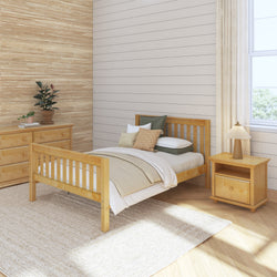 Cozy bedroom with wooden furniture, including a bed, dresser, and nightstand, featuring neutral bedding and decor.