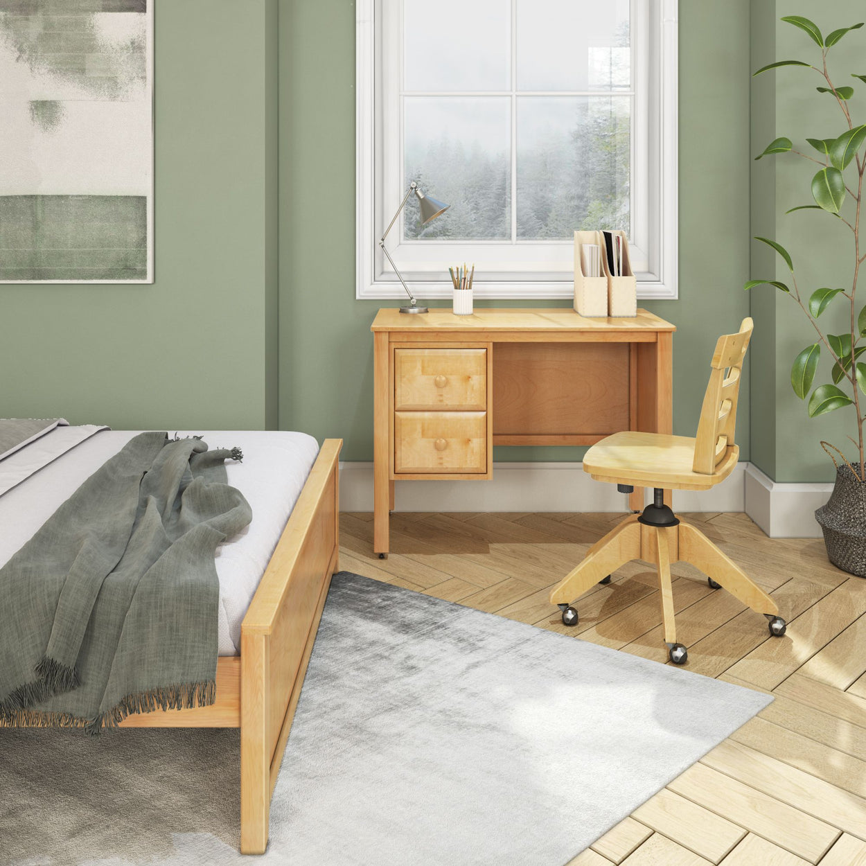 Modern bedroom with wooden desk, ergonomic chair, and green walls, featuring natural light and cozy decor.
