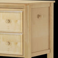 Wooden bedside table with two drawers and a cabinet door, showcasing natural wood grain and round knobs.