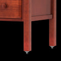 Modern wooden furniture leg with caster wheels.