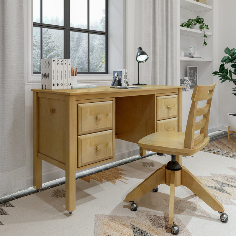 Maple wood home office desk and matching swivel chair in minimalist study nook with lamp, books, potted plant and snowy window view