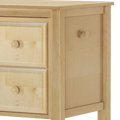 Light wood two-drawer nightstand with round wooden knobs and natural pine finish, minimalist bedside table