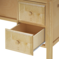 Open light maple wood drawer with round wooden knob in bedside cabinet, showing interior and metal drawer slide — bedroom storage furniture