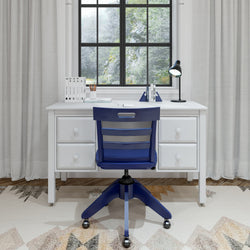 Modern home office setup with a white desk, blue chair, desk lamp, and window view.