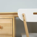 Minimalist Scandinavian light-wood desk with drawers and a white modern chair with wooden legs, close-up in a home office.