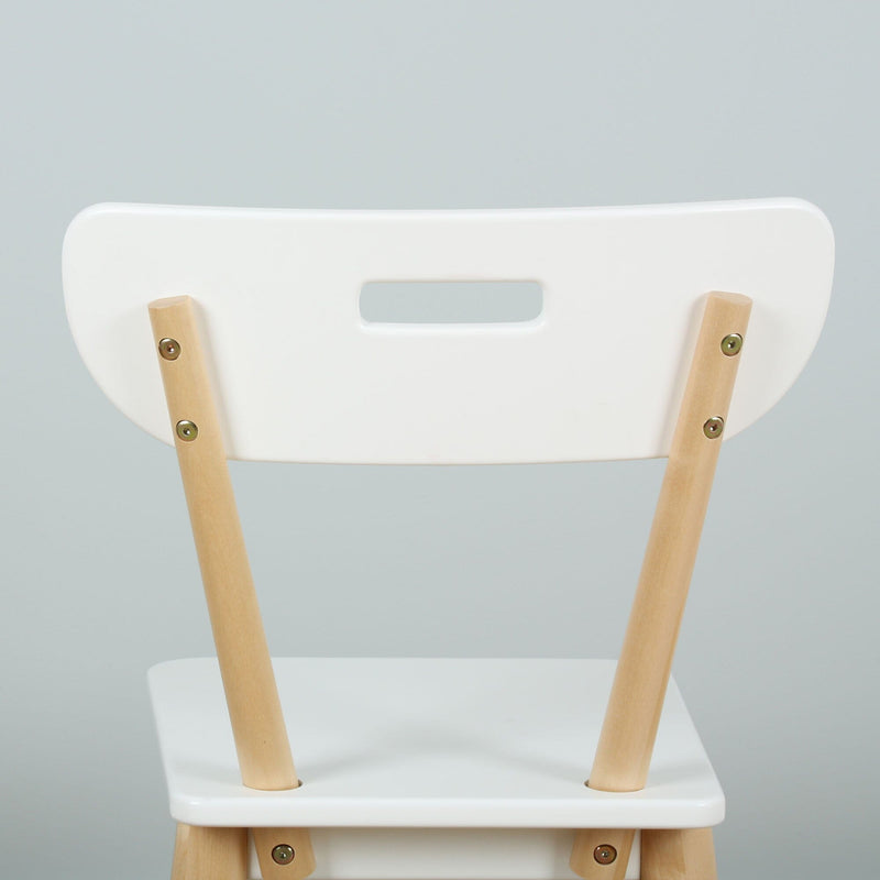 White modern Scandinavian dining chair with light wood legs and cutout handle on backrest, minimalist seating