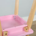 Close-up of pink wooden kids' chair showing natural wood legs, metal screws and assembly hardware
