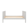 White wooden slatted platform bed frame with wooden mattress slats and paneled headboard and footboard, modern farmhouse bedroom furniture