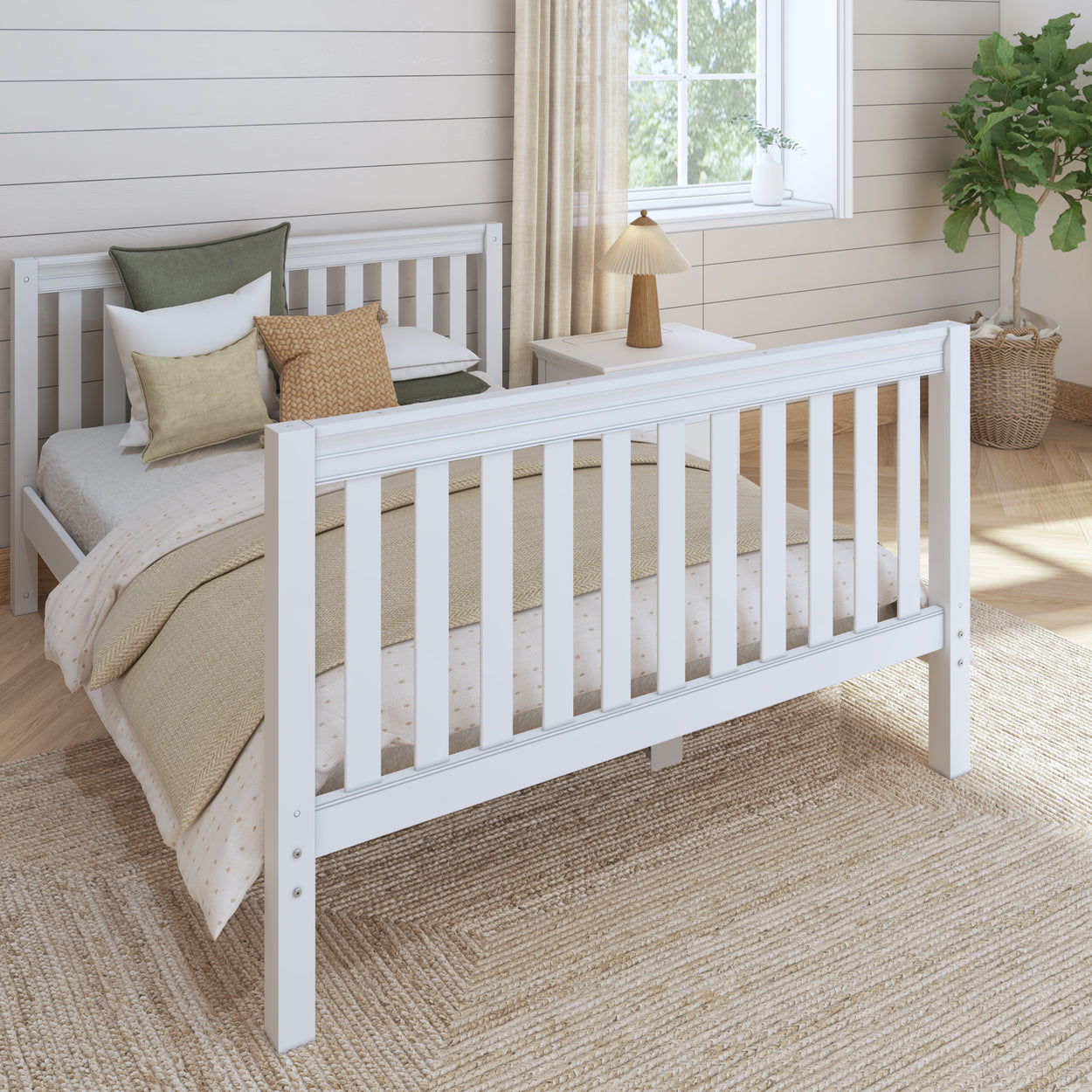 White wooden bed frame with cozy neutral bedding in a bright, modern bedroom.