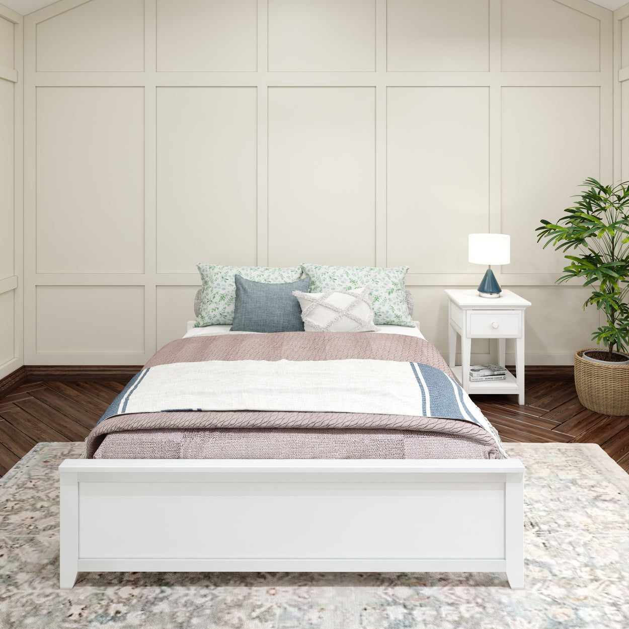 Elegant bedroom with a white wooden bed frame, cozy bedding, patterned pillows, a white bedside table with a lamp, and a potted plant for a serene ambiance.