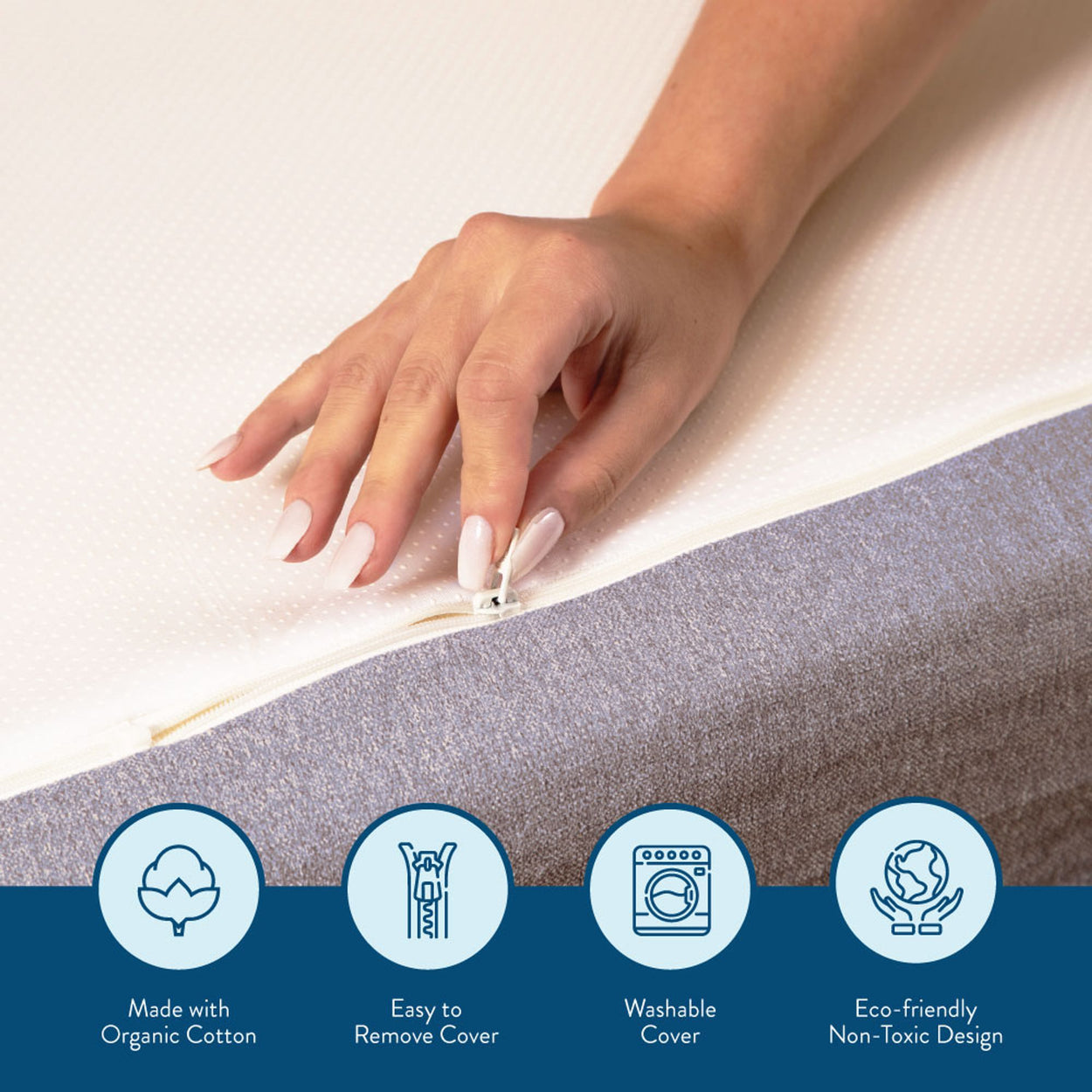 Hand unzipping an organic cotton mattress protector, highlighting easy-to-remove and washable cover, eco-friendly design.