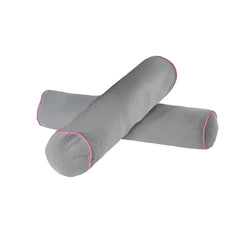 Gray bolster pillows with pink piping detail on a white background.