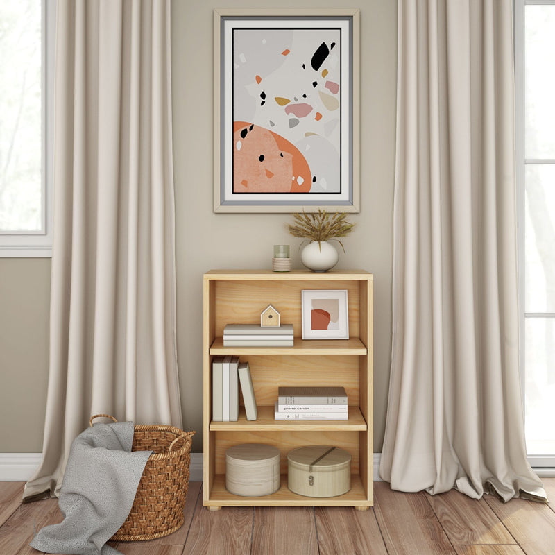 Shelf with decorative items and abstract art, modern living room interior design.