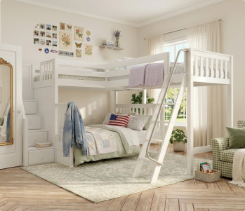 Light wood dresser with an open drawer filled with folded white towels, coastal bedroom decor featuring a decorative knot sculpture and ocean art print