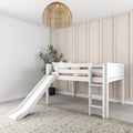White children's loft bed with slide in a neutral nursery, soft pink bedding, board-and-batten wall paneling, rattan pendant light and indoor plant