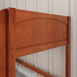 Wooden bed headboard with paneling against a white wall, perfect for modern bedroom decor.