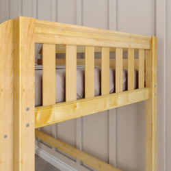 Wooden bunk bed frame in a cozy bedroom setting.