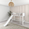 White wooden loft bed with slide in a modern neutral kids' bedroom with rattan pendant light, board-and-batten accent wall, soft rug and indoor plant