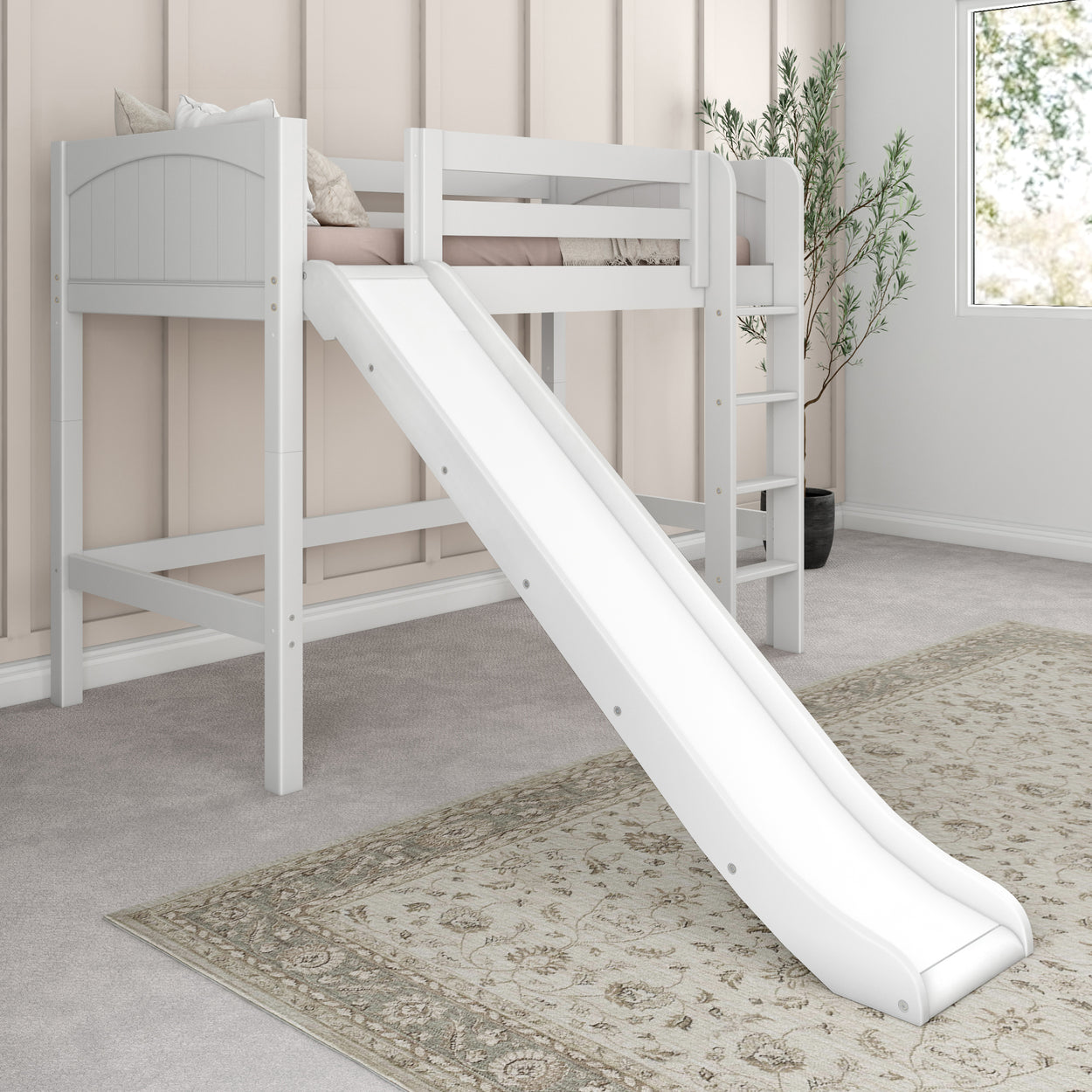 White loft bed with slide and ladder in a modern kids' bedroom featuring a textured rug and potted plant.